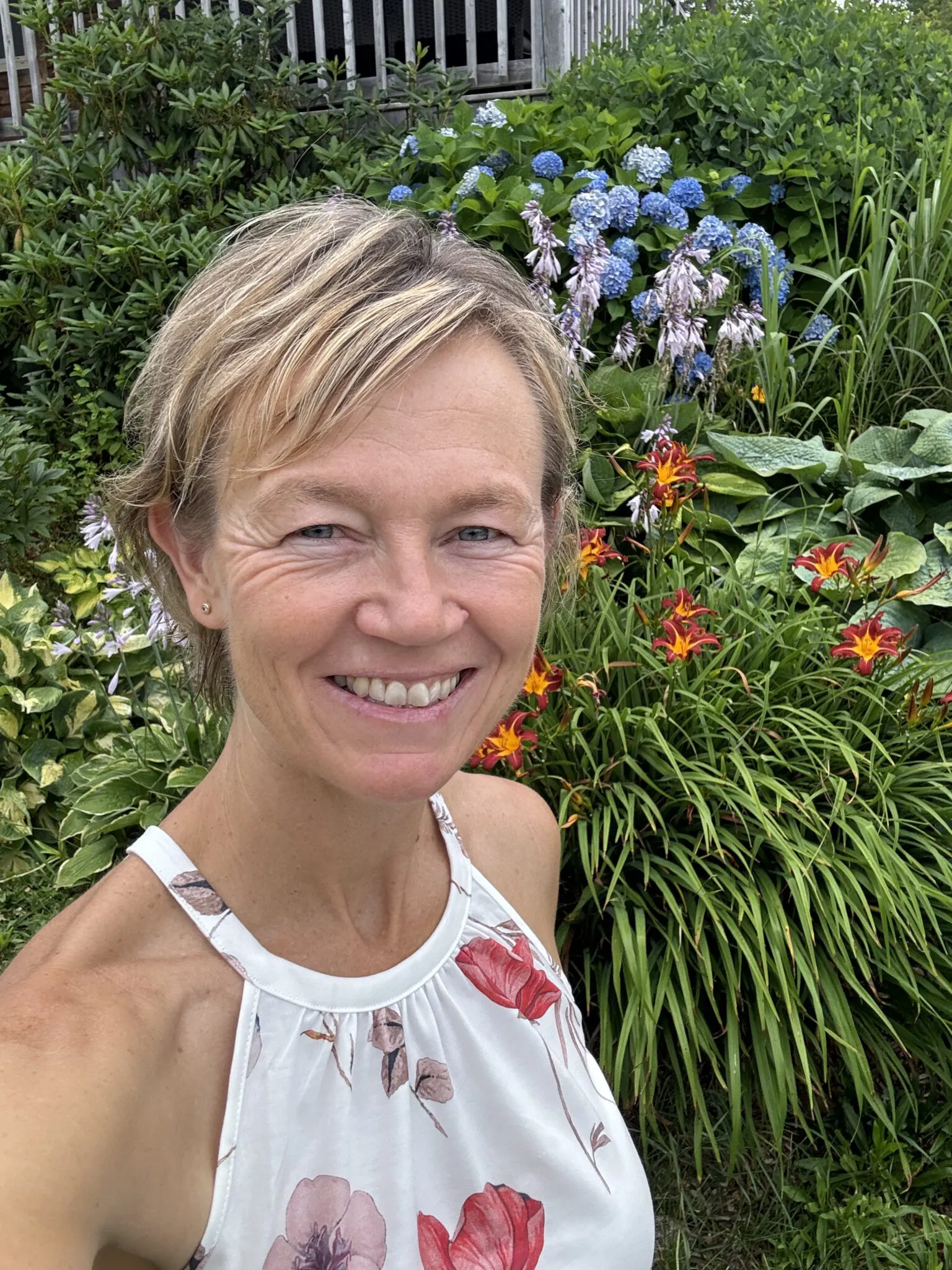 Dr. Tiffany Keenan smiling in her garden